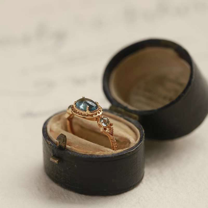 Every Sea is an Island: Vintage Blue Topaz Open Ring in Gold-Plated 925 Silver