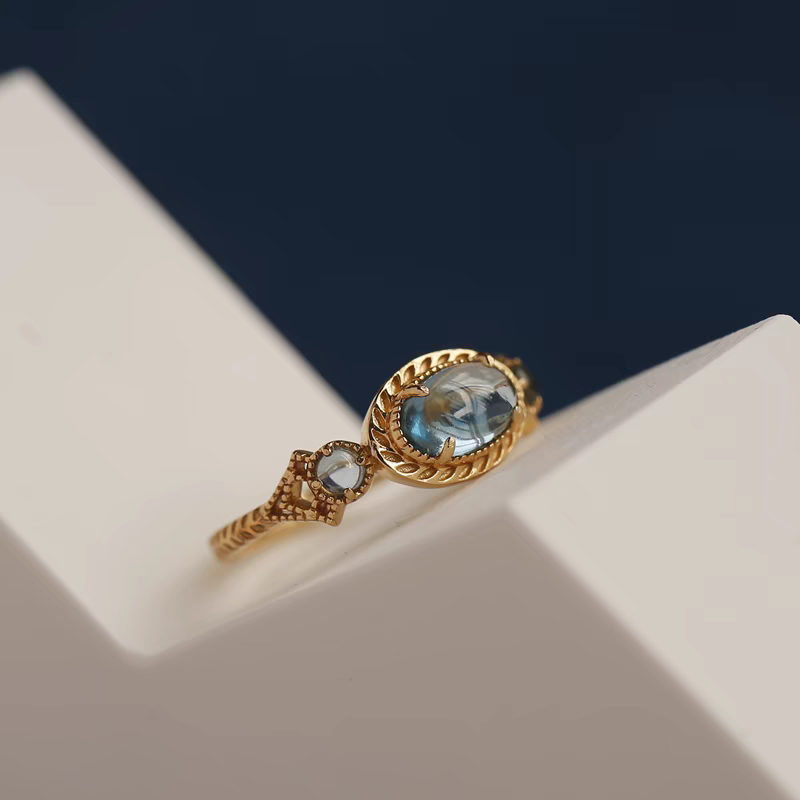 Every Sea is an Island: Vintage Blue Topaz Open Ring in Gold-Plated 925 Silver